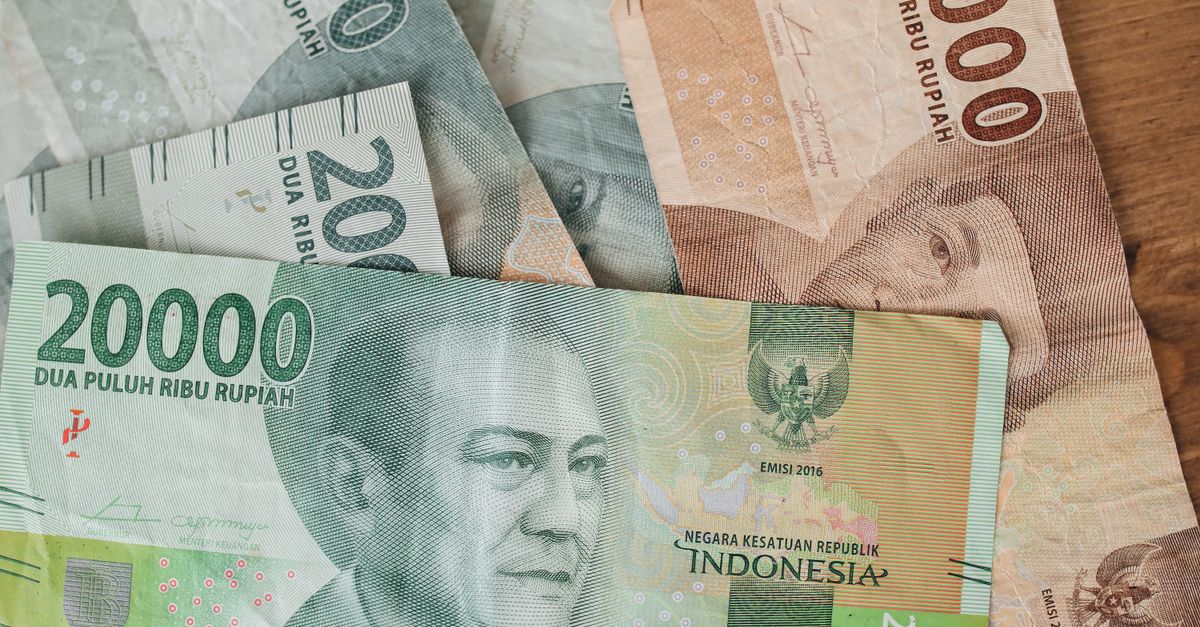 Close-up shot of various denominations of Indonesian Rupiah banknotes.