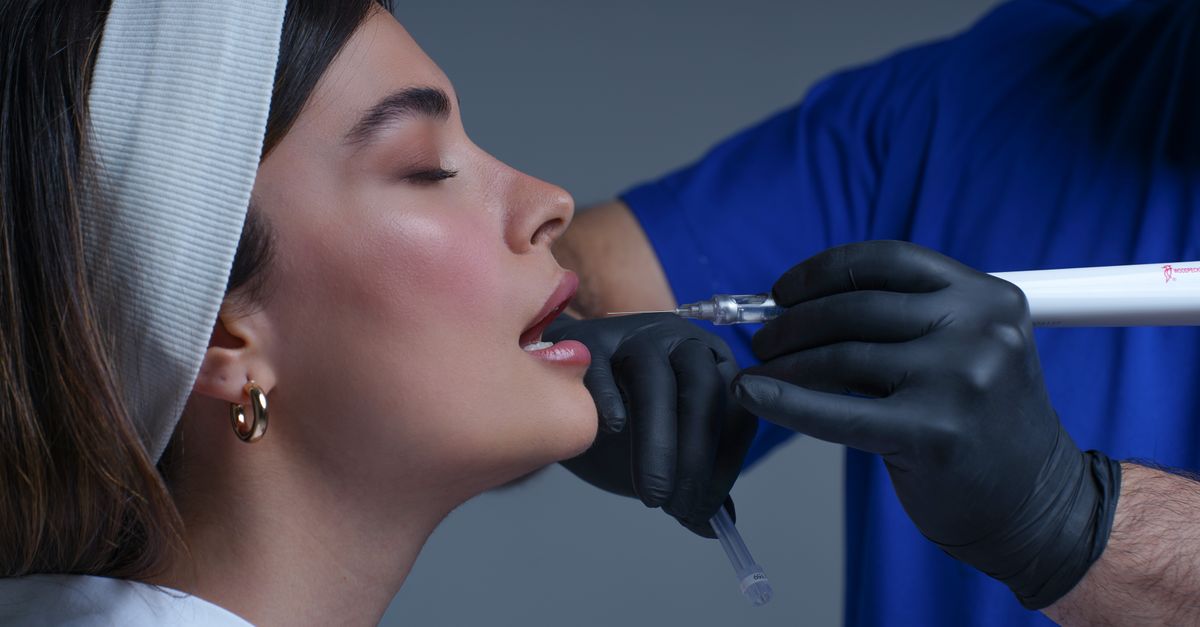 A woman receives a modern cosmetic skin treatment at a Bali medi spa clinic.