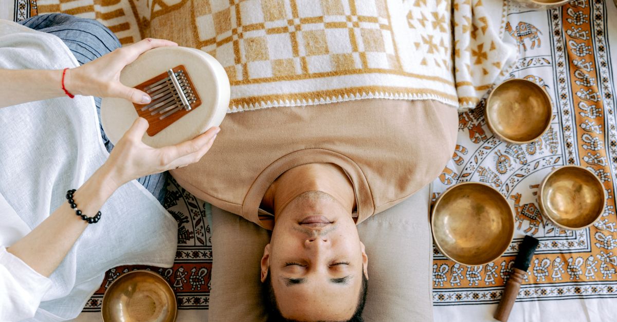 A sound bath session with singing bowls, of the kind offered at sound healing sessions in Ubud